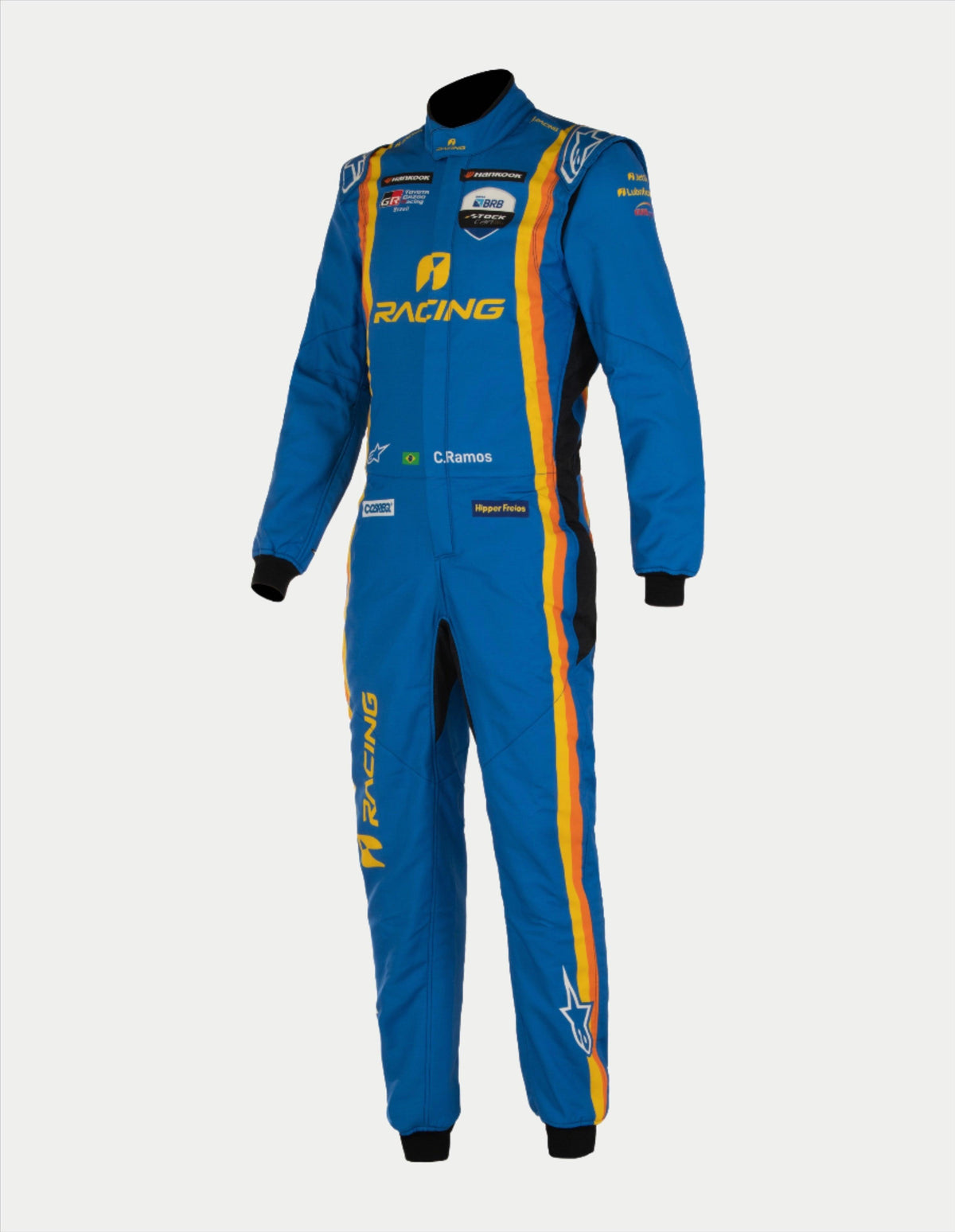 Alpinestars Tech Vision V3 specialdesignet køredragt, blå med orange og gule striber, FIA-certificeret racerdragt.