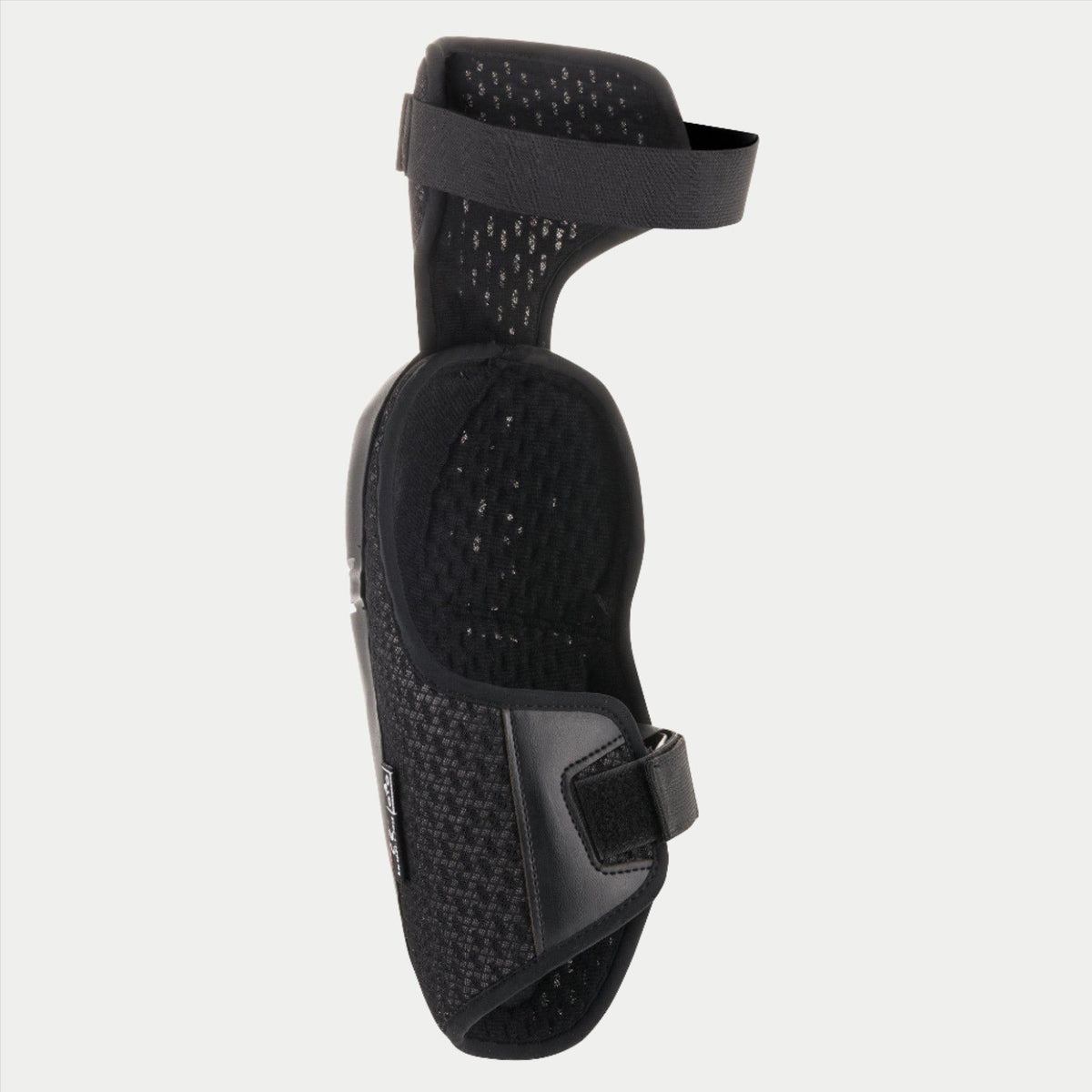 Alpinestars Youth Bionic Plus knæbeskytter, sort, viser den indvendige mesh-foring og det dobbelte stropsystem, ergonomisk design til off-road motocross-beskyttelse
