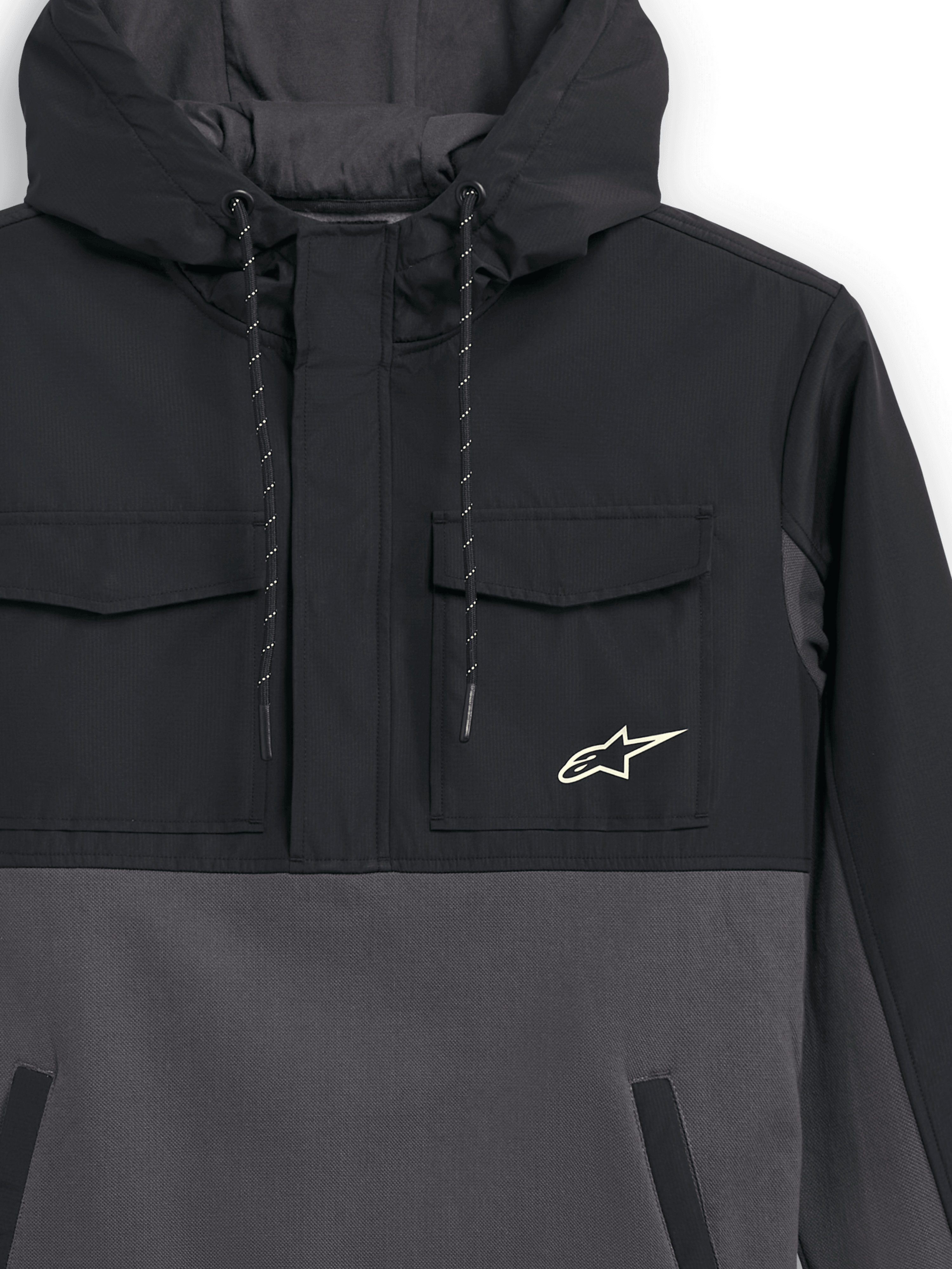 Alpinestars Juncture Hybrid Jacket, Black and Gunmetal, close-up view of the front, mixed-material anorak with ripstop chest pockets and canvas fleece body, Alpinestars star logo on chest, drawstring hood, casual motorsport streetwear