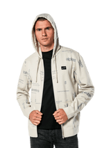 Alpinestars Plenitude Hoodie, casual sportswear, Off White zip-front fleece with all-over grey logo graphics, worn by a man with the hood up over a black shirt, featuring a small chest logo patch and kangaroo pocket