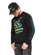 Alpinestars Ayess CSF langærmet T-shirt, sort langærmet trøje med neongul og cyan grafik, stort AS-logo på brystet og lodret Alpinestars-branding på ærmet, båret af en model med en matchende sort kasket og mørke jeans, uformelt motorsport livsstilstøj
