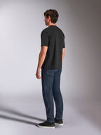 Alpinestars Aplomb Oversized CSF Tee, kortærmet t-shirt, sort, set bagfra på model, afslappet motorsport-inspireret streetwear, afslappet oversized pasform