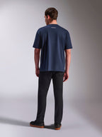 Alpinestars Focused Oversized CSF Tee, kortærmet t-shirt, navy, set bagfra med lille hvidt Alpinestars tekstlogo øverst på ryggen, afslappet oversized silhuet, afslappet motorsport-inspireret streetwear