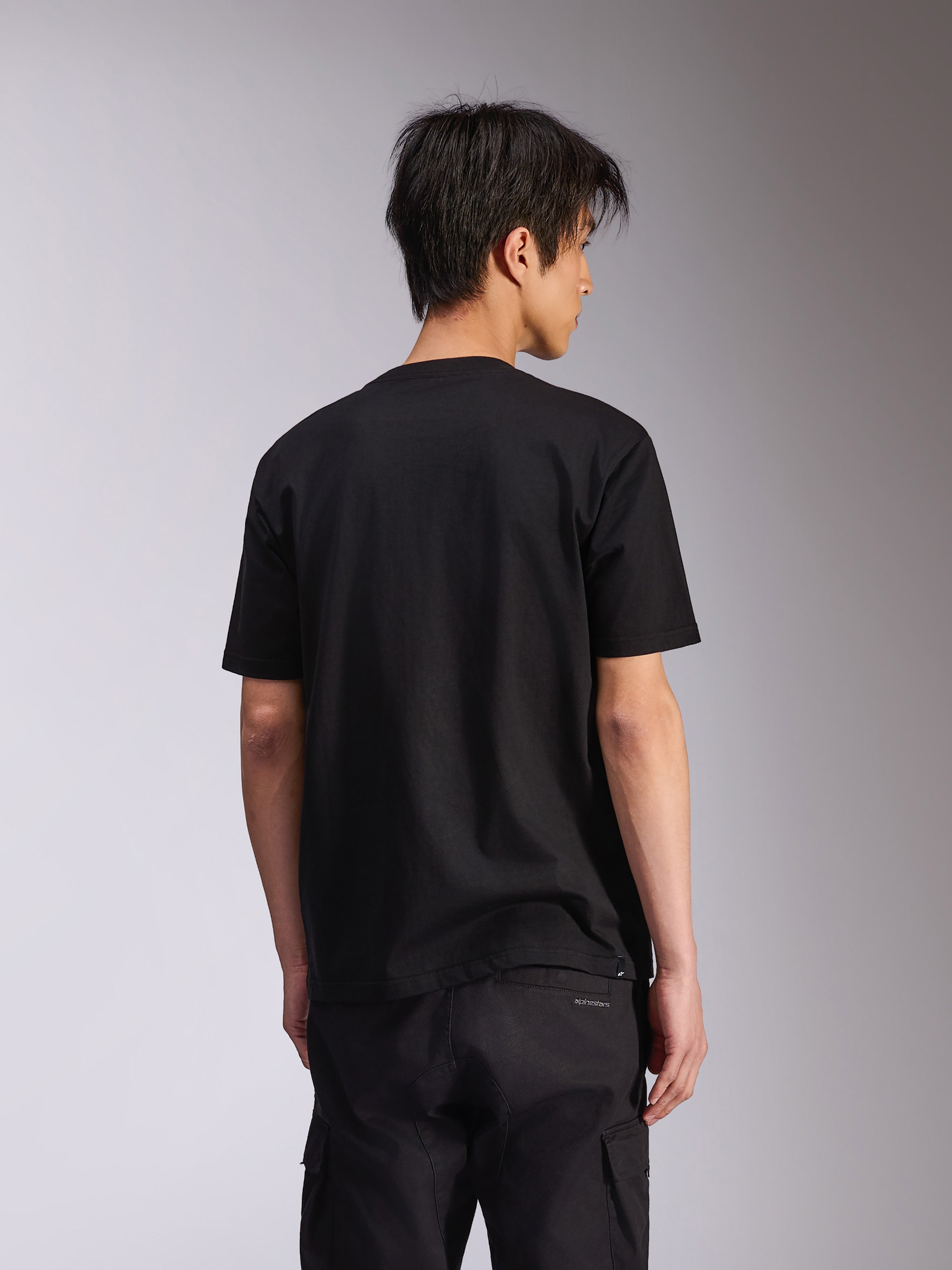 Alpinestars Noka CSF Tee, kortærmet t-shirt, sort, set bagfra, afslappet motorsport-inspireret streetwear