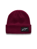 Alpinestars Unload Rib Cuff Hue, mørkerød beanie med strikket jersey-søm og sort vævet Astars-logopatch, afslappet sportswear