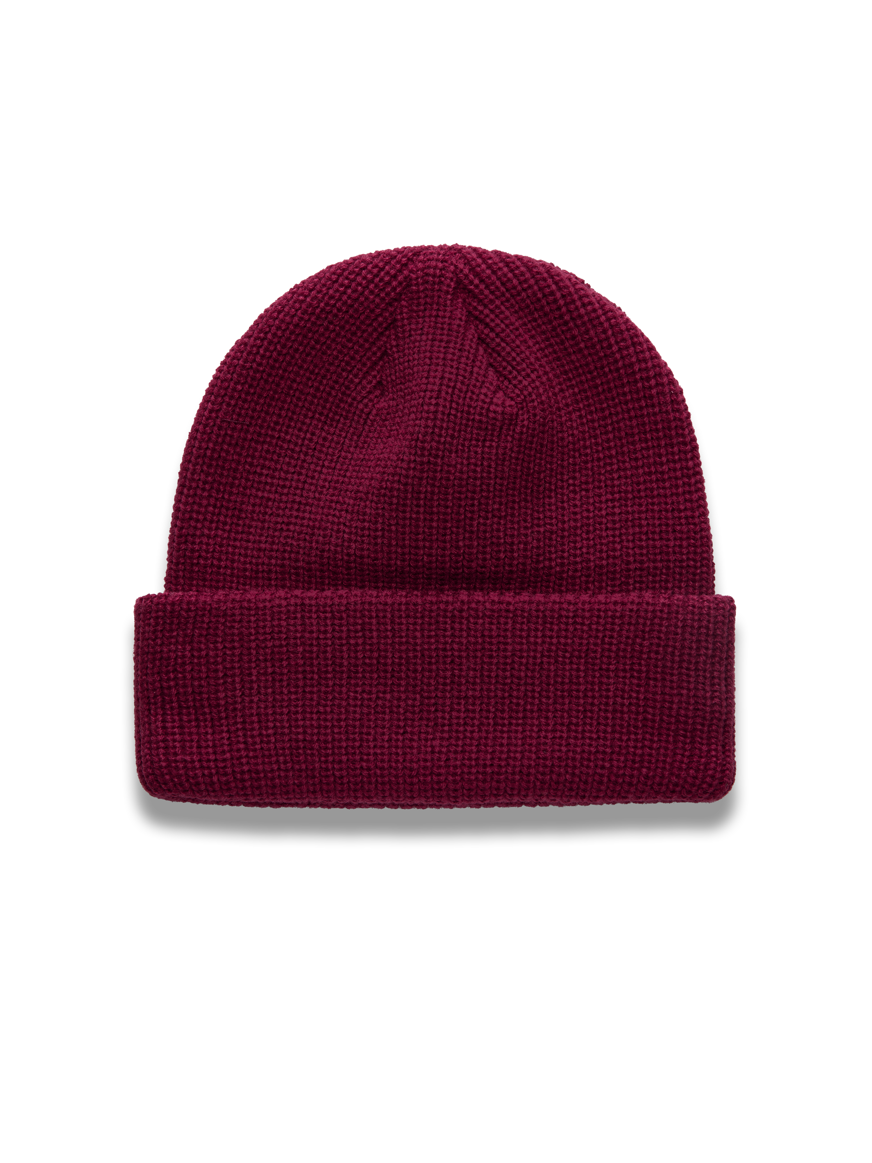 Alpinestars Unload Rib Cuff Hue, rød livsstilsbeanie med ribstrikket opslag og lav pasform i jersey-søm.