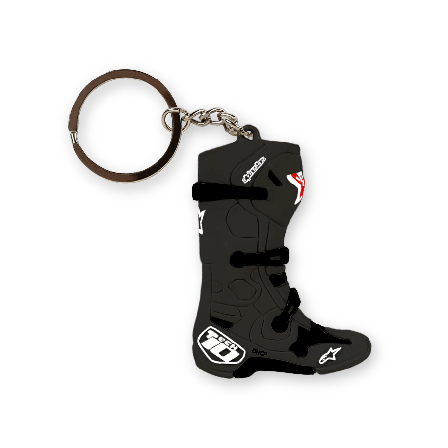 Alpinestars New Tech 10 Boot nøglering, sort med hvide og røde detaljer, 3D-miniaturegengivelse af den ikoniske motocrossstøvle, detaljerede støbte spænder og branding, sølvfarvet nøglering i metal