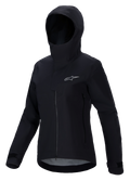 Alpinestars Stella A-Dura Elite vandtæt jakke, MTB-jakke til kvinder, sort, med hætte og beskyttende stormflap, lynlås foran, sidelommer med lynlås og justerbare velcromanchetter, teknisk vandtæt stof med et sølvlogo på brystet