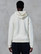 Alpinestars Essentials Ageless Zip Hoodie, set bagfra, Off White, afslappet streetwear, premium kompakt fleece, afslappet pasform, ribstrikkede manchetter og kant, rent minimalistisk design