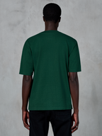 Alpinestars Essentials Ageless SS Tee, kortærmet T-shirt, Pine Green, set bagfra på model, afslappet pasform, økologisk bomuld, casual motorsport-inspireret streetwear