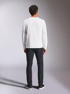 Alpinestars Trackside CSF Tee - Long Sleeve, White, back view of long-sleeve t-shirt, worn with black pants and sneakers, featuring a small black label at the hem, casual motorsport-inspired streetwear