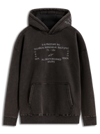 Alpinestars Infinite Washed Oversized Hoodie, vasket sort hættetrøje med broderede racing-logoer og kængurulomme.