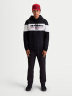Alpinestars Cubic hættetrøje, herre pullover fleece, sort og hvid, med farveblokeret bryst og Alpinestars Racing Ahead logo, komfortabel bomuldsblanding til afslappet motorsportstil.