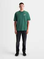 Alpinestars Checkback Oversized CSF T-shirt, grøn kortærmet sportstøj t-shirt, herremodel med oversized fit og et lille Astars-logo på brystet, afslappet motorsport-stil.