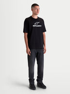 Alpinestars Prelude Oversized CSF T-shirt, kortærmet sportswear-T-shirt i sort med hvidt logo på brystet, oversized pasform for afslappet komfort, bomulds- og polyesterblanding.