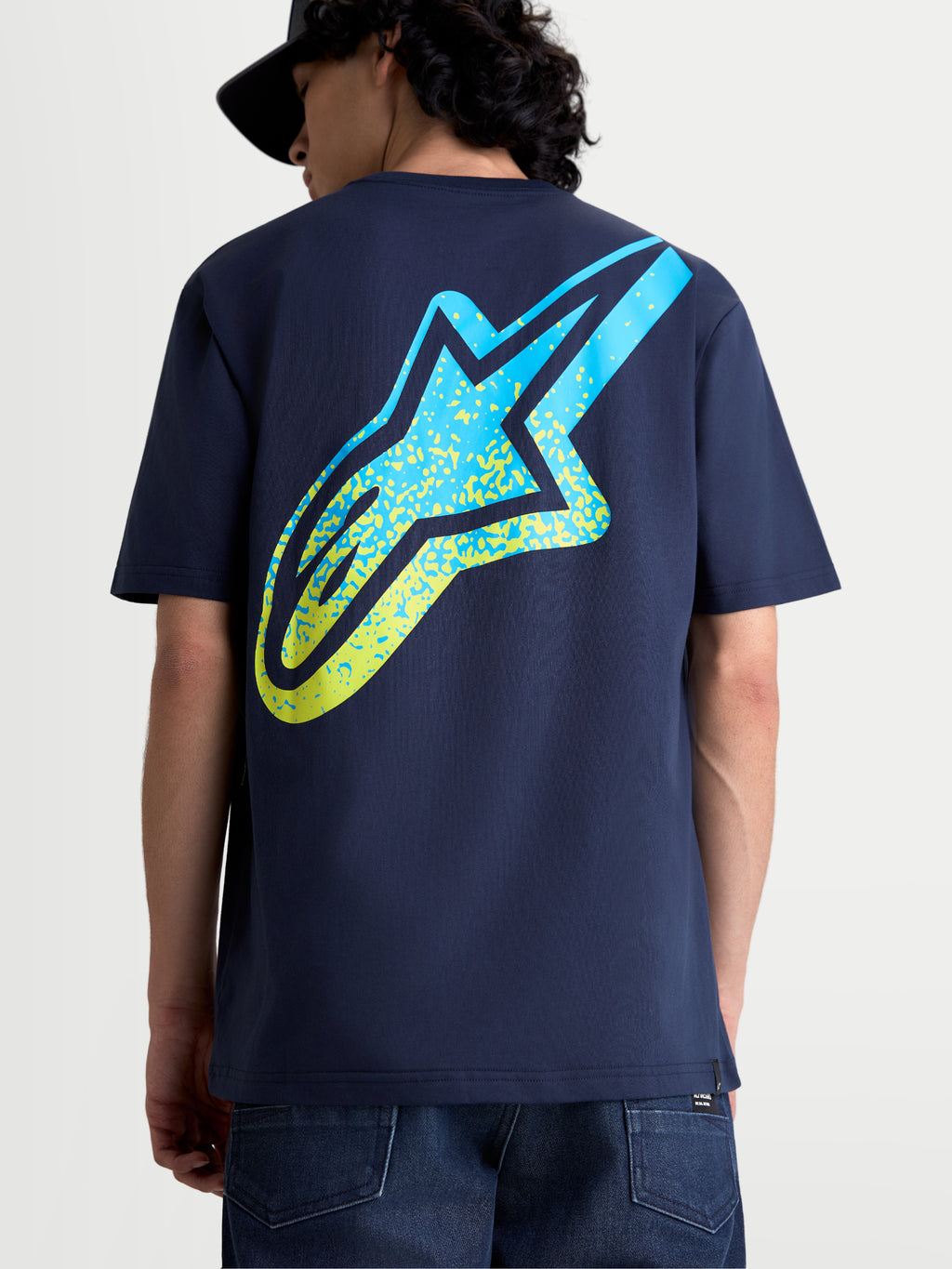 Alpinestars Meteor CSF t-shirt, kortærmet t-shirt til herre og dame set bagfra med et stort gult og blåt gradient Astars-logo på ryggen, mørkeblå, afslappet motorsport sportstøj