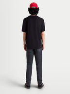 Alpinestars Elliptogrit CSF T-shirt, herre-T-shirt med korte ærmer, sort, set bagfra på model, premium bomulds-polyesterblanding, afslappet sportswear til hverdagsbrug.