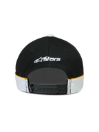 Alpinestars 500 Snapback kasket, motorsport livsstilskasket, sort og hvid med gule accenter, justerbar snapback-lukning, set bagfra med hvidt broderet Astars-logo og cut-and-sew-detaljer med kontrastpiping.
