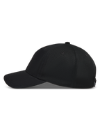 Alpinestars Dylan Dad Hat, sort kasket med buet skygge og ustruktureret twillkrone, set fra siden.