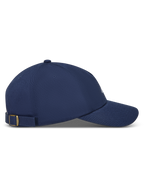 Alpinestars Dylan Dad Hat, mørkeblå kasket i bomuldstwill med buet skygge og remlukning, sideprofil.
