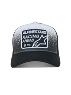Alpinestars Gravel Trucker cap, sort og hvid kasket med grusteksturprint, mesh-bagside og vævet logopatch på fronten.