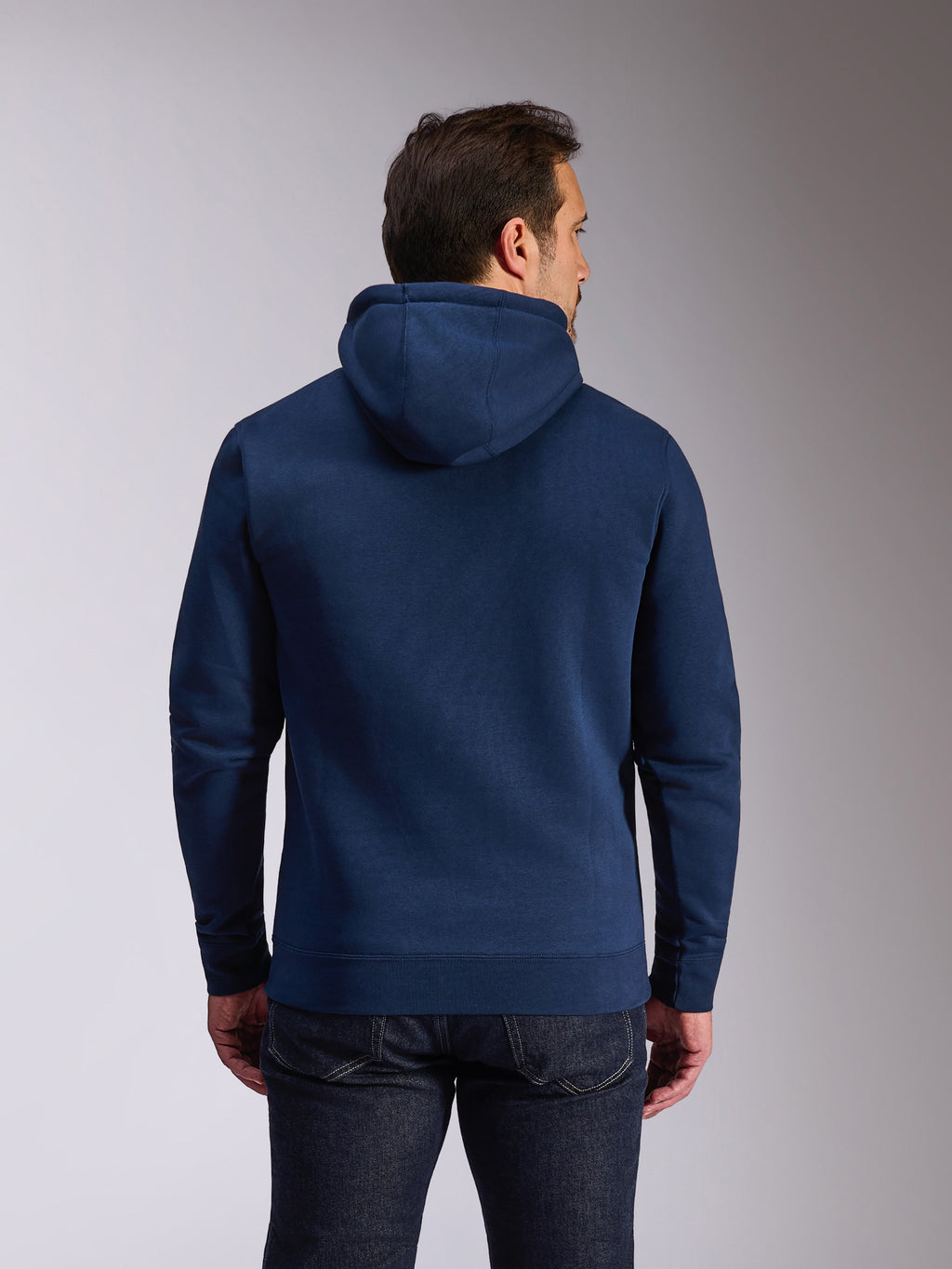 Alpinestars Ride V3 Hoodie, mørkeblå pullover fleece, set bagfra viser ensfarvet blåt design med jersey-foret hætte, ribstrikkede manchetter og kant, afslappet motorsport streetwear