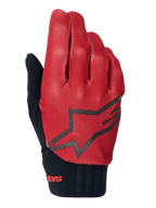 Alpinestars A-Dura handsker, MTB-cykelhandsker, mørk orange og sort, overdel med tekstureret gittermønster, stort sort stjerne-logo, sort neoprenmanchet med rød branding, designet til mountainbike-greb og ydeevne