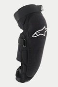 Alpinestars Ve cto r Pr o kn æ-/s ki nne ben sbes kyt ter, sor t, med hvi dt Al pin est ars -log o på kn æet, tek stu rer et sli dst ærk t fro ntp ane l, jus ter bar e kro g-o g-l økk e str opp er, ånd bar t MTB -be sky tte lse sud sty r