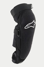 Alpinestars Ve cto r Pr o kn æ-/s ki nne ben sbes kyt ter, sor t, med hvi dt Al pin est ars -log o på kn æet, tek stu rer et sli dst ærk t fro ntp ane l, jus ter bar e kro g-o g-l økk e str opp er, ånd bar t MTB -be sky tte lse sud sty r