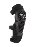 Alpinestars Bionic Plus knæ- og skinnebensbeskyttere, sort, off-road- og MTB-beskyttelse, perforeret bikubemønstret skal med hvidt Alpinestars-logo, dobbelte justerbare remme, 3D-mesh-ventilation, ergonomisk buet design