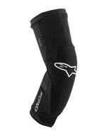 Alpinestars Paragon Plus knæbeskyttere, sort og hvid, MTB mountainbike-beskyttelse, åndbart slip-on mesh-sleeve, kurvet ergonomisk design med hvidt stjernelogo, polstret konstruktion til off-road kørsel