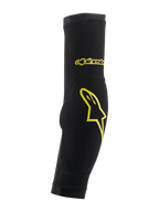 Alpinestars Paragon Plus albubeskyttere, sort og Acid Yellow, slip-on ærme-design med integreret polstring, gult stjerne-logo og tekstbranding, åndbart mesh til MTB-beskyttelse