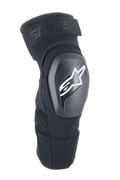 Alpinestars A-Impact Plasma Elite Shield knæbeskyttere, sort med hvidt stjerne-logo, hård ydre TPU-skal, mesh-stof med justerbar rem foroven, forbuet ergonomisk design, MTB- og off-road-beskyttelse