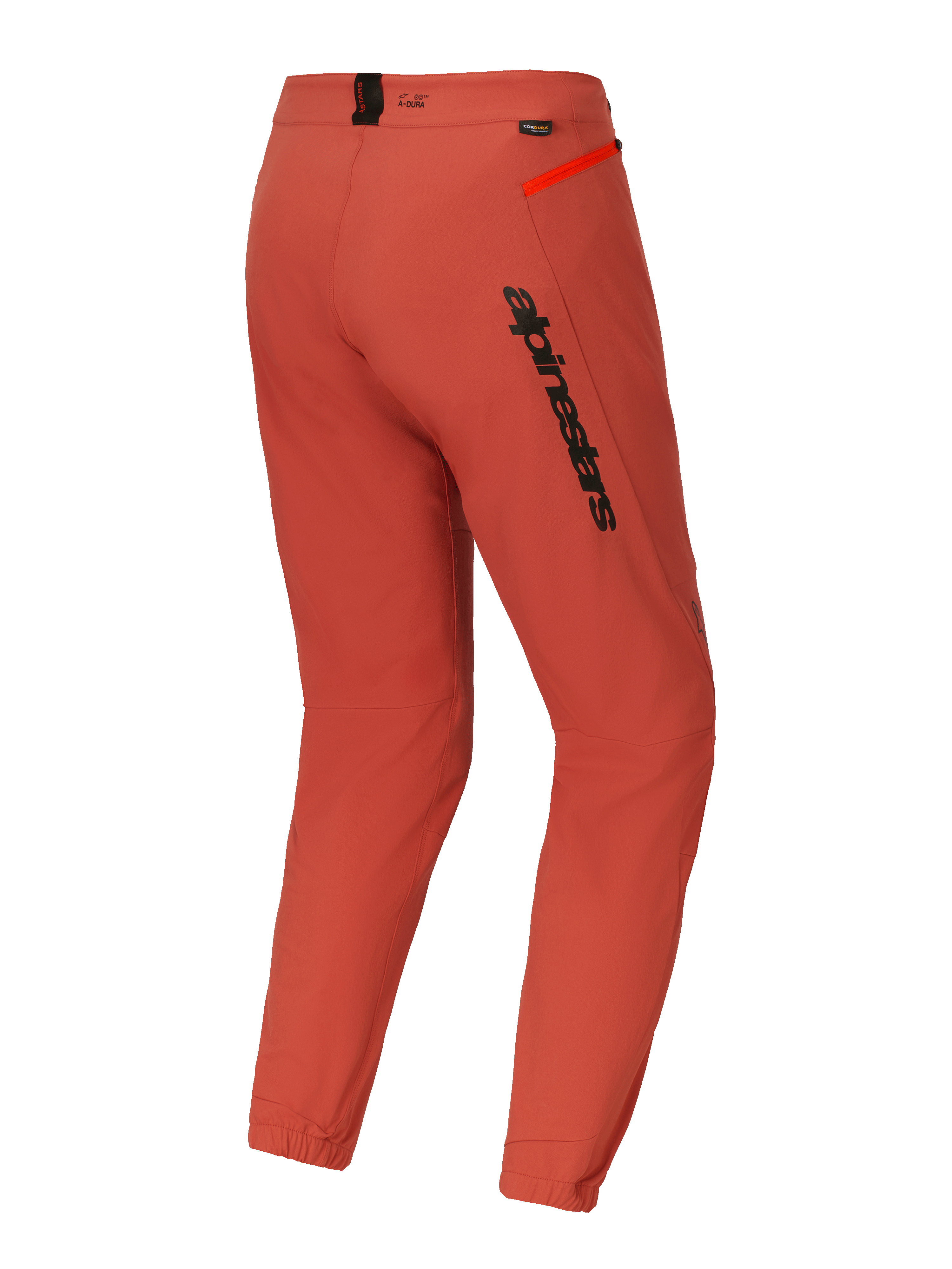 Alpinestars A-Dura Elite bukser, mountainbike (MTB) bukser, mørk orange, set skråt bagfra med markant sort Alpinestars-branding på låret, stærk orange lynlåsdetalje på hoften og elastiske ankelmanchetter, teknisk performance-cykeludstyr