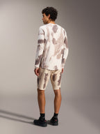 Alpinestars A-Dura Ride langærmet trøje i Sand Camo, set bagfra, performance MTB-top med camouflagemønster.