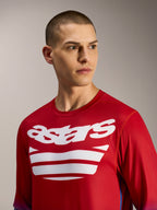 Alpinestars A-Dura ASTARS Jersey 2.0, langærmet MTB-trøje i rød og blå med hvid logografik på brystet.