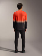 A-Dura ASTARS Jersey 2.0 i orange og sort gradient, langærmet mountainbike-trøje set bagfra, afslappet MTB-stil.