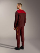 Alpinestars A-Dura Blocked trøje 2.0 i bordeaux og rød, langærmet teknisk MTB-trøje set bagfra.