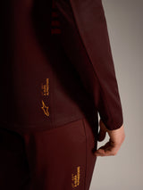A-Dura Elite langærmet trøje i bordeaux med gult Alpinestars-branding, teknisk trail-udstyr.