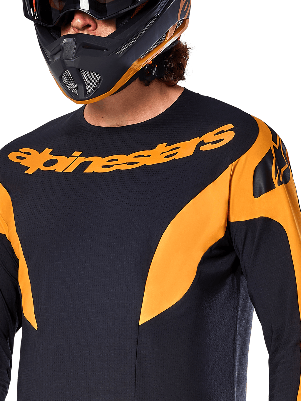 Alpinestars A-Supra Race Jersey - Langærmet, sort med orange grafikpaneler, stort orange Alpinestars-navnetræk på brystet, vist på en rytter iført en matchende sort og orange full-face hjelm, performance MTB-racerbeklædning