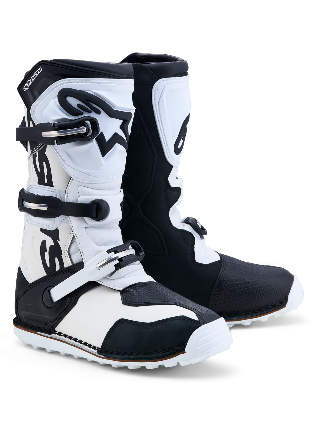 Alpinestars Tech-T støvler, trials-motorcykelstøvler i sort og hvidt læder med tre spænder og TPU-skinneplade.
