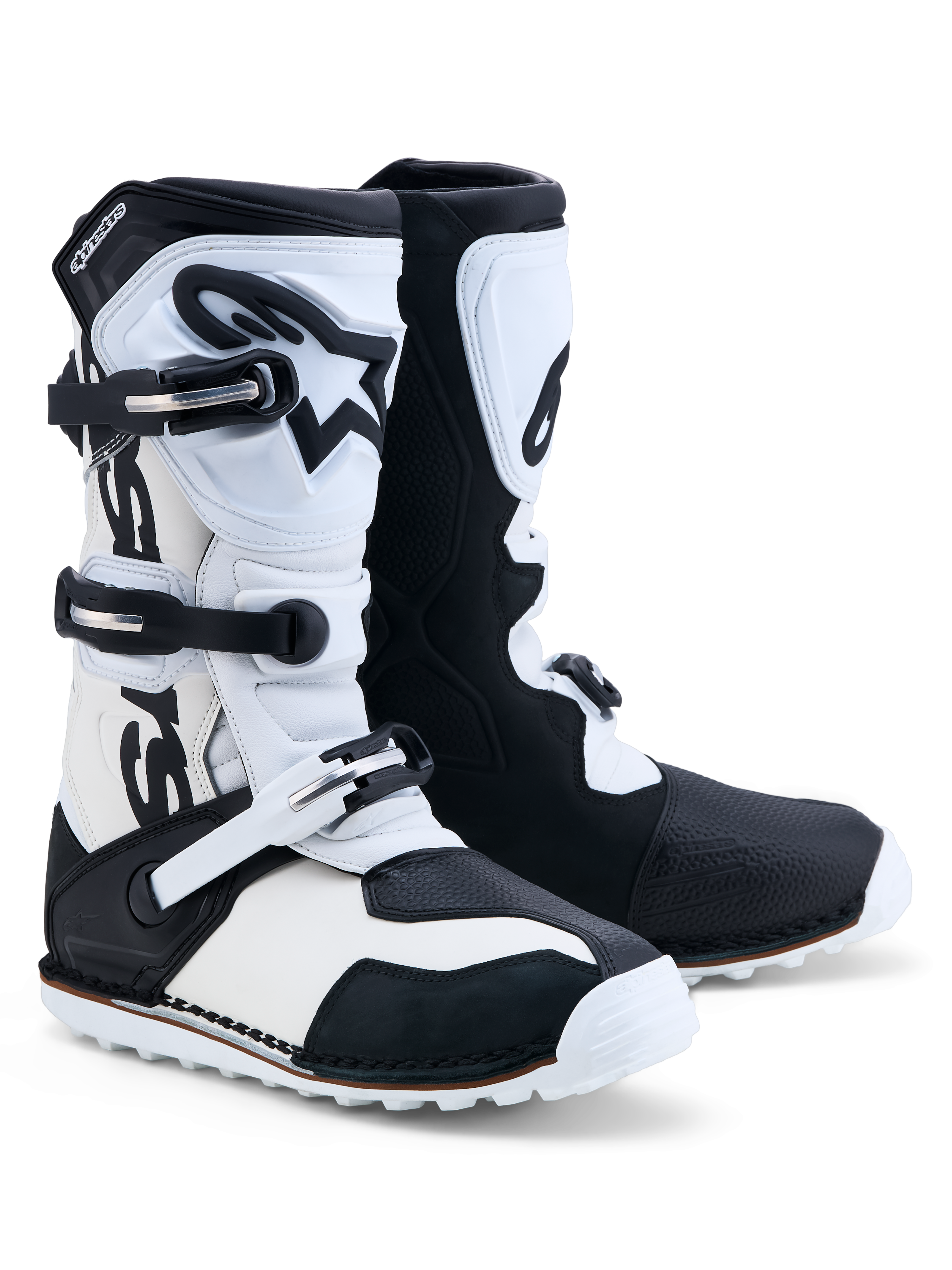 Alpinestars Tech-T støvler, trials-motorcykelstøvler i sort og hvidt læder med tre spænder og TPU-skinneplade.