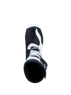 Alpinestars Tech-T støvler, sort og hvid, trialstøvler i læder set oppefra med spændelukning til off-road kontrol.