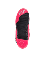 Alpinestars Tech 10-støvler, motocross-støvler, Diva Pink og sort, set fra bunden med mønstret slidbane, udskiftelig fodhvilerindsats og karakteristisk Astars-logo, designet til overlegent greb og holdbarhed.