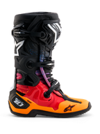 Alpinestars Limited Edition Tech 10 Black Hole Boots, Motocross Racing Boots, Black Burst colorway featuring red and orange gradients with blue speckles, white Alpinestars star logos, triple buckle closure system, and protective DHCP heel chassis, side profile