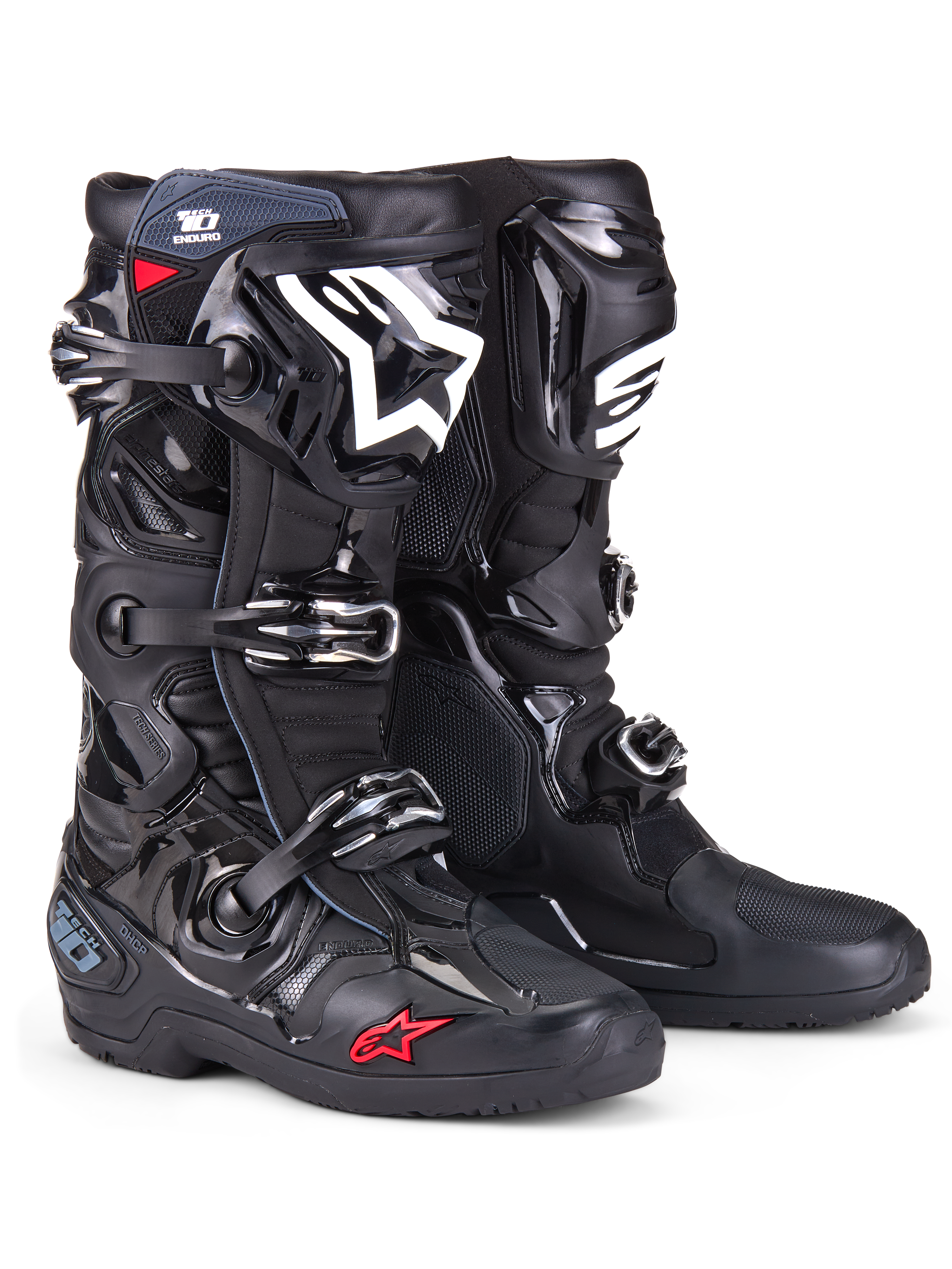 Alpinestars Tech 10 Enduro-støvler, motocross-støvler, sort med hvidt skinnebenslogo og lille rød stjernedetalje, med tredobbelt spændelukkesystem, holdbar TPU-beskyttelse og specialiseret enduro-sål til terrænkørsel