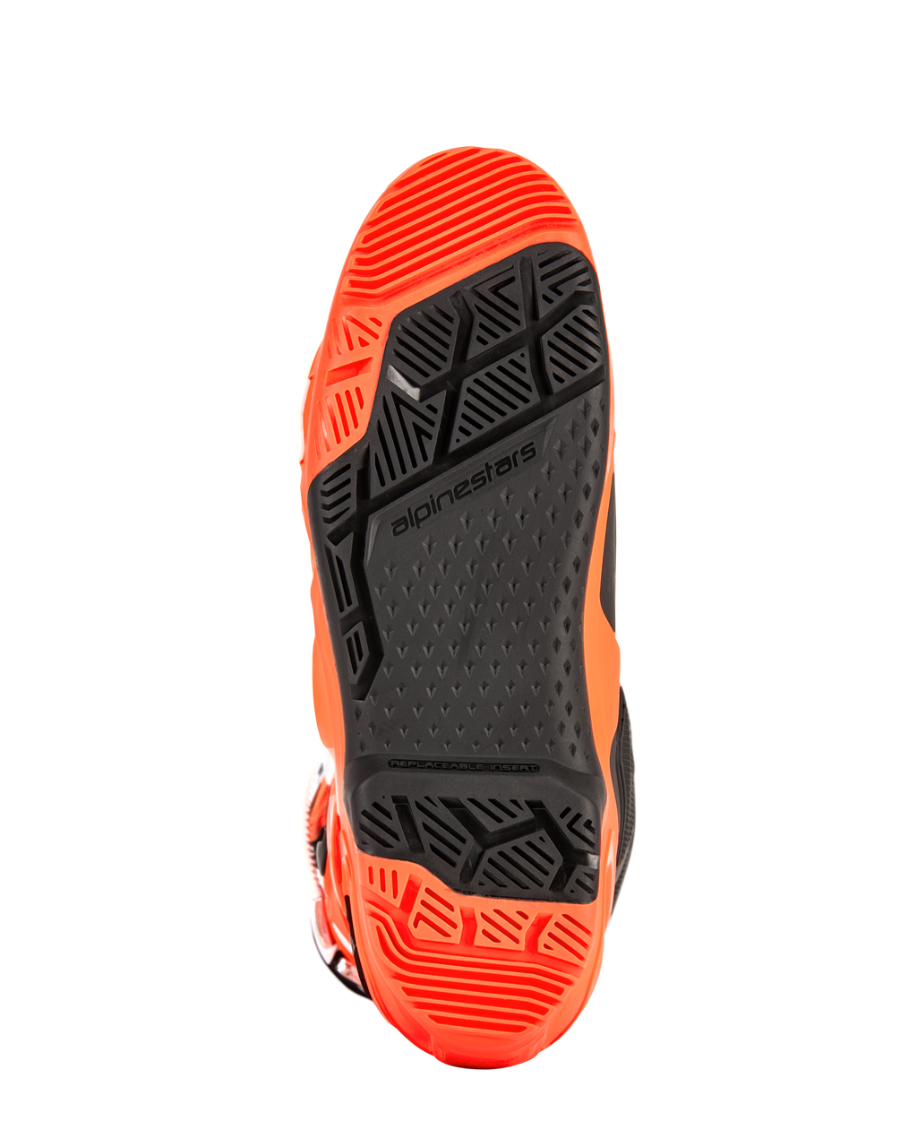 Alpinestars Tech 10 Enduro-støvler, detaljeret visning af sålen, Orange Fluo og sort, med en specialiseret dobbelt sammensat slidbane med geometriske mønstre for højt greb og en udskiftelig fodhvilerindsats til off-road-performance.