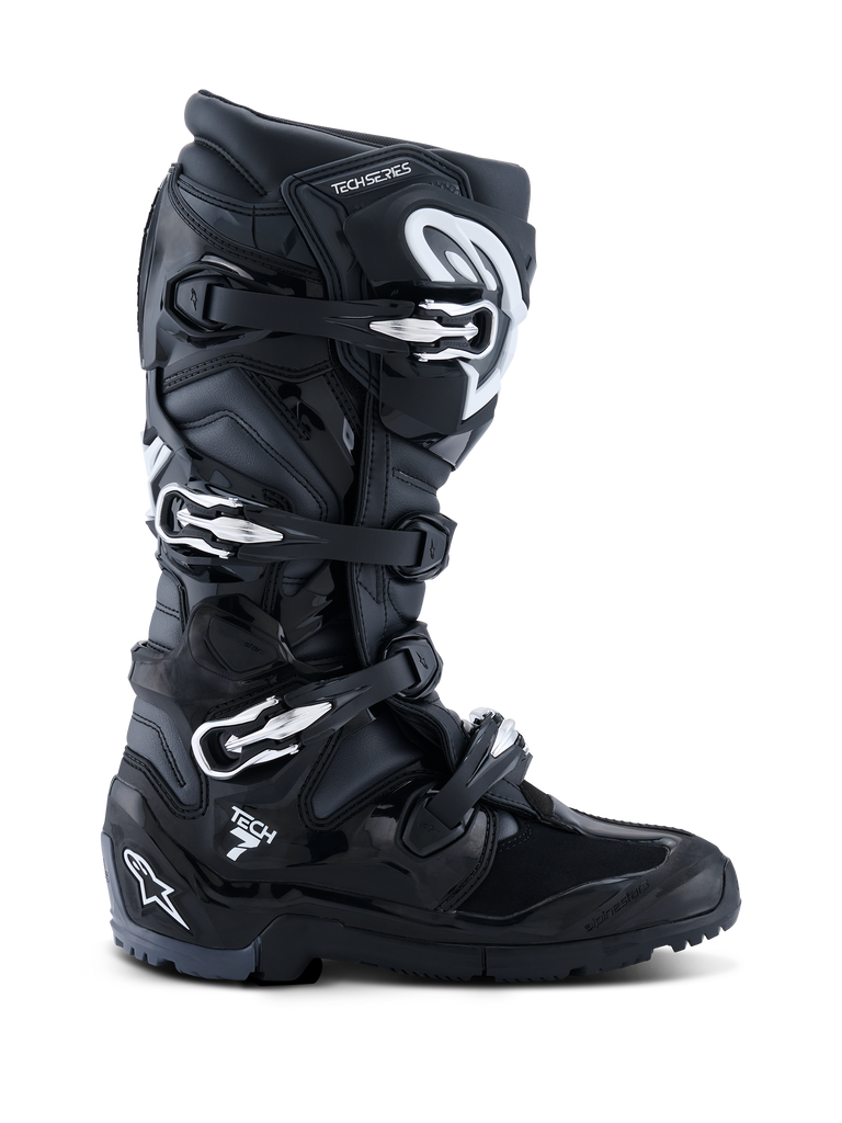 Alpinestars 2026 Tech 7 Enduro Boots, Black Anthracite White, specialized off-road motorcycle boots featuring a four-buckle closure system, durable PU-reinforced microfiber upper, and a rugged lugged sole for enduro terrain, sleek design with prominent Tech 7 branding on the heel.
