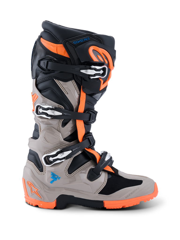 Alpinestars 2026 Tech 7 Enduro Boots, Motocross and Enduro Boots, Black Warm Gray and Orange Fluo, side profile view, featuring a four-buckle closure system, TPU protective panels, and a specialized dual-compound orange sole for off-road performance