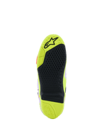 Alpinestars Tech 10 Supervented støvler, detaljeret visning af sålen, Gul Fluo og sort, bikagemønstret greb, udskiftelig midterindsats, tekstureret overflade for trækkraft på fodhvilerne